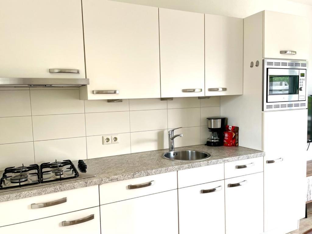 Vakantiewoningen De Schelp เรอเนสเซอ ภายนอก รูปภาพ